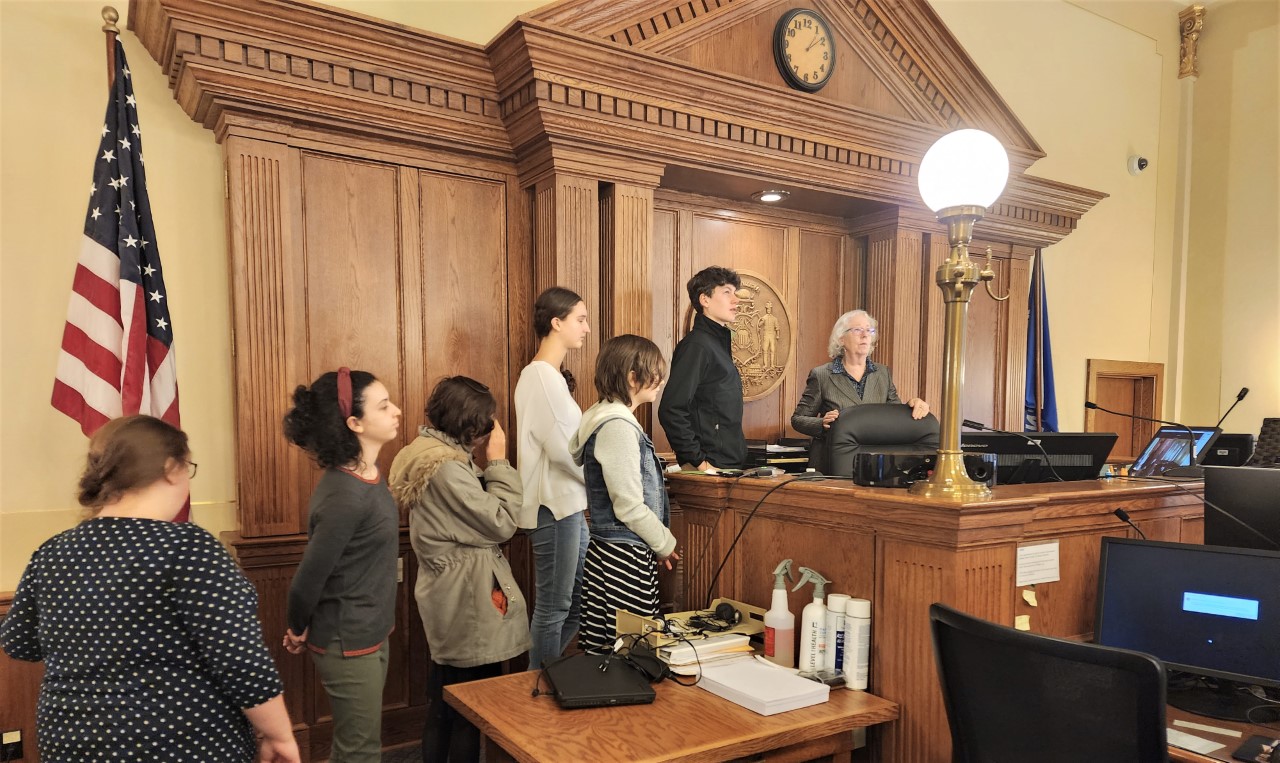 Teen Court panelist tour courtroom with Judge.