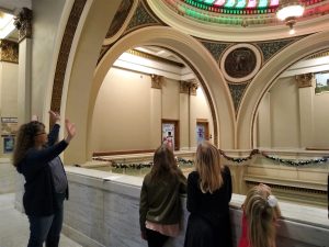 Youth looking at courthouse ceiling