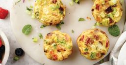 Egg bites resting on a plate.